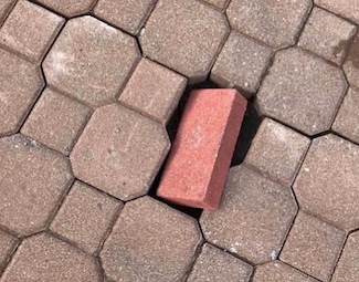 wrong brick in the road