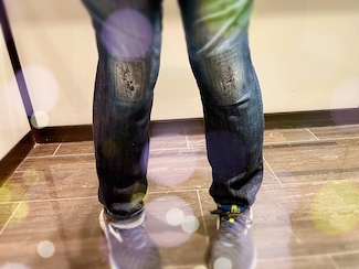 blue jeans with patched knees