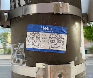 cartoon on street pole in Philadelphia