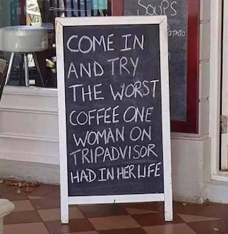 sign outside of a coffee shop