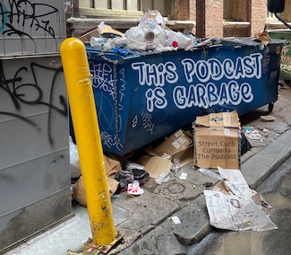 garbage in an alley promoting the podcast street curb curiosity