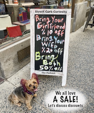 discount sale sign outside a local business in Philadelphia USA