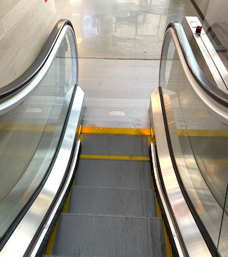 going down an escalator; about to get off