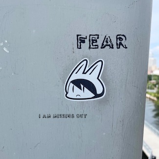 fear stickers on street pole