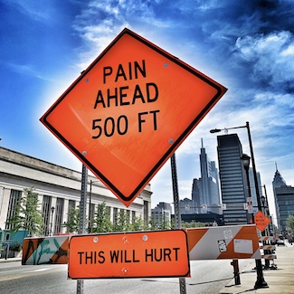 funny road construction sign about pain to promote a podcast