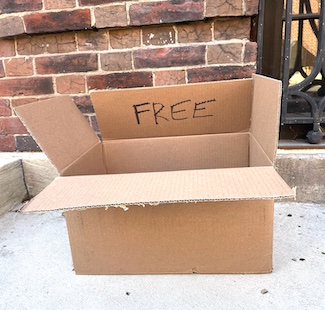cardboard box with the word freeform a give away