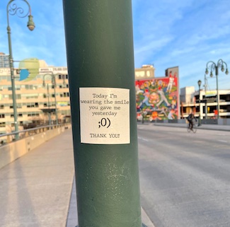 Thank You quote sticker on a street pole in Philadelphia