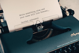 typewriter with quote on paper