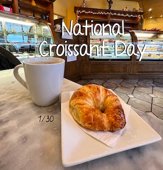hot coffee and flaky treat for national croissant day in January in the USA