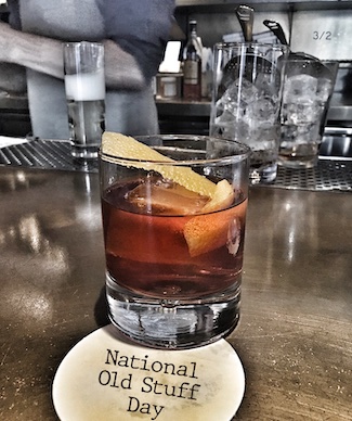 an old fashioned whisky drink at a bar for a very special day