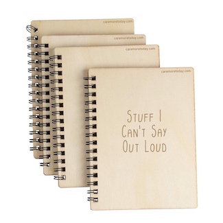 image of notebooks of notes of ideas to promote blog www.caremoretoday.com 