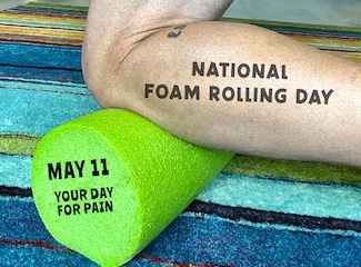 a knee on a green foam roller for national foam rolling day on May 11 for the daily blog from www.caremoretoday.com
