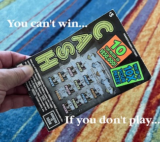 a used lottery ticket as a metaphor for life; you can't win if you don't play from the motivational blog www.caremoretoday.com