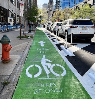 a fresh new bike lane to highlight a podcast conversation about bike lanes, and how people abuse them, from street curb curiosity.