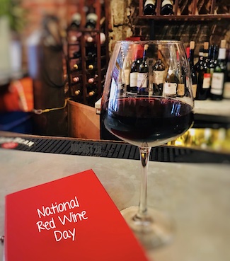 a glass of tasty red wine for national red wine day on August 28, fro m the daily thought blog www.caremoretoday.com