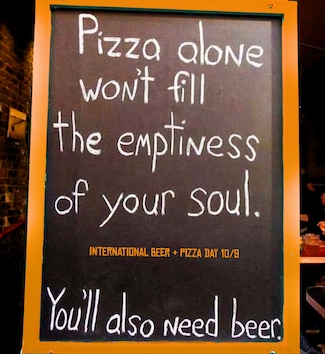 a fun bar sign suggesting pizza and beer are needed together for true happiness