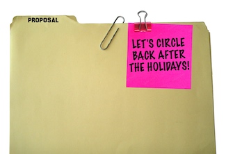 A sales proposal folder with a note stalling until next year as the usual end-of-year experience, from the daily thought blog:  www.caremoretoday.com