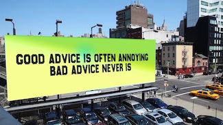 a bright yellow and green outdoor sign about advice