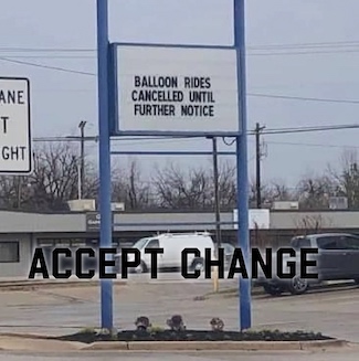 a parking lot sign about balloon rides in a shopping center about being cancelled