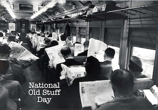 a commuter train filled with people going to work, all reading the morning newspaper