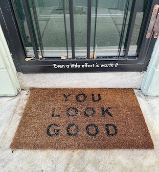 an outdoor door mat that says you look good