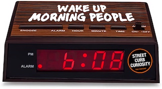 an old style alarm clock used for a discussion about morning people, on a podcast from Street Curb Curiosity