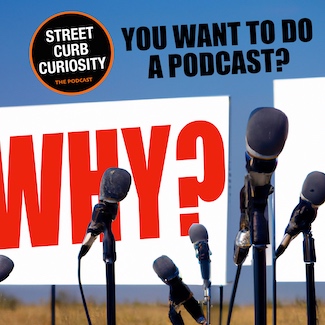 a billboard surrounded by microphones asking the question WHY you want to do your own podcast.  An episode from Street Curb Curiosity