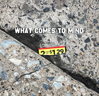 a torn price tag on a city street to make you ponder what you can buy for $1.29