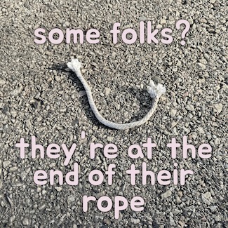 a small piece of frayed rope on a sidewalk to highlight the struggle of some people during the holiday