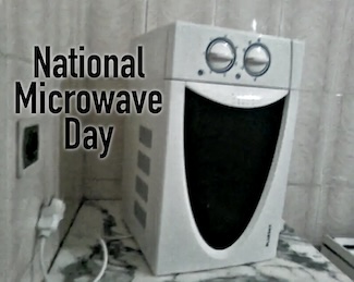 A white small microwave oven on its side appears to be smiling on National Microwave day in December