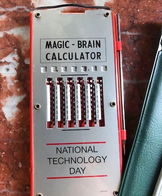 an early version of an analog calculator for National technology day
