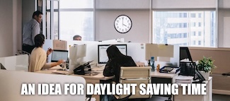 an office setting with a few people and a clock on the wall showing 4pm