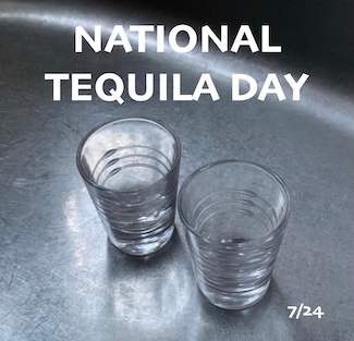 a black and white image of two empty shot glasses for national tequila day in July