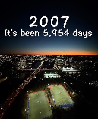 a sunset on a clear evening over south philadelphia and Penn Park