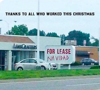 A clever Christmas sign in a shopping strip mall for the holidays