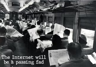 an old black and white image of a commuter train filled with people other way to work, all reading a newspaper