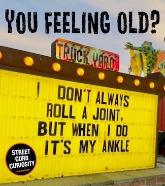 a large brightly lit yellow sign about feeling old