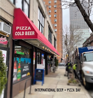 a store selling hot pizza and cold beer for the international holiday for this great combination