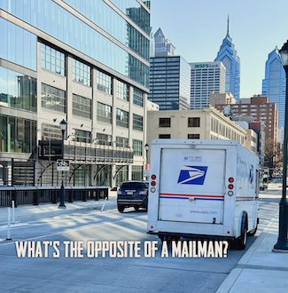 a USPS truck on a city street in Philadelphia