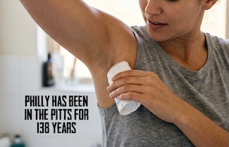 a woman applying underarm deodorant to commemorate the first commercially available product made in Philadelphia 